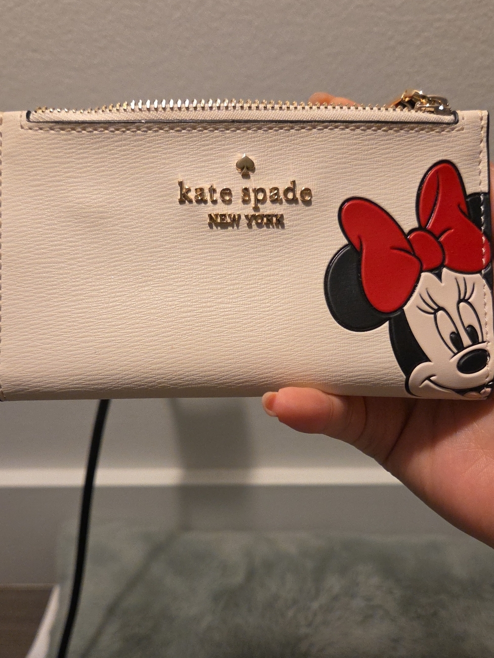 kate spade x Disney white Minnie Mouse zip-around wallet with red bow